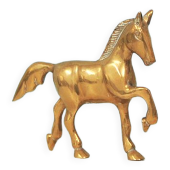 golden bronze statuette walking horse