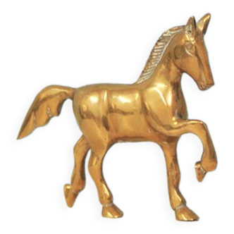 Statuette en bronze doré marchant à cheval