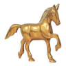 golden bronze statuette walking horse