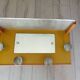 1950s coat rack with mirror, metal hooks, and glass shelf.