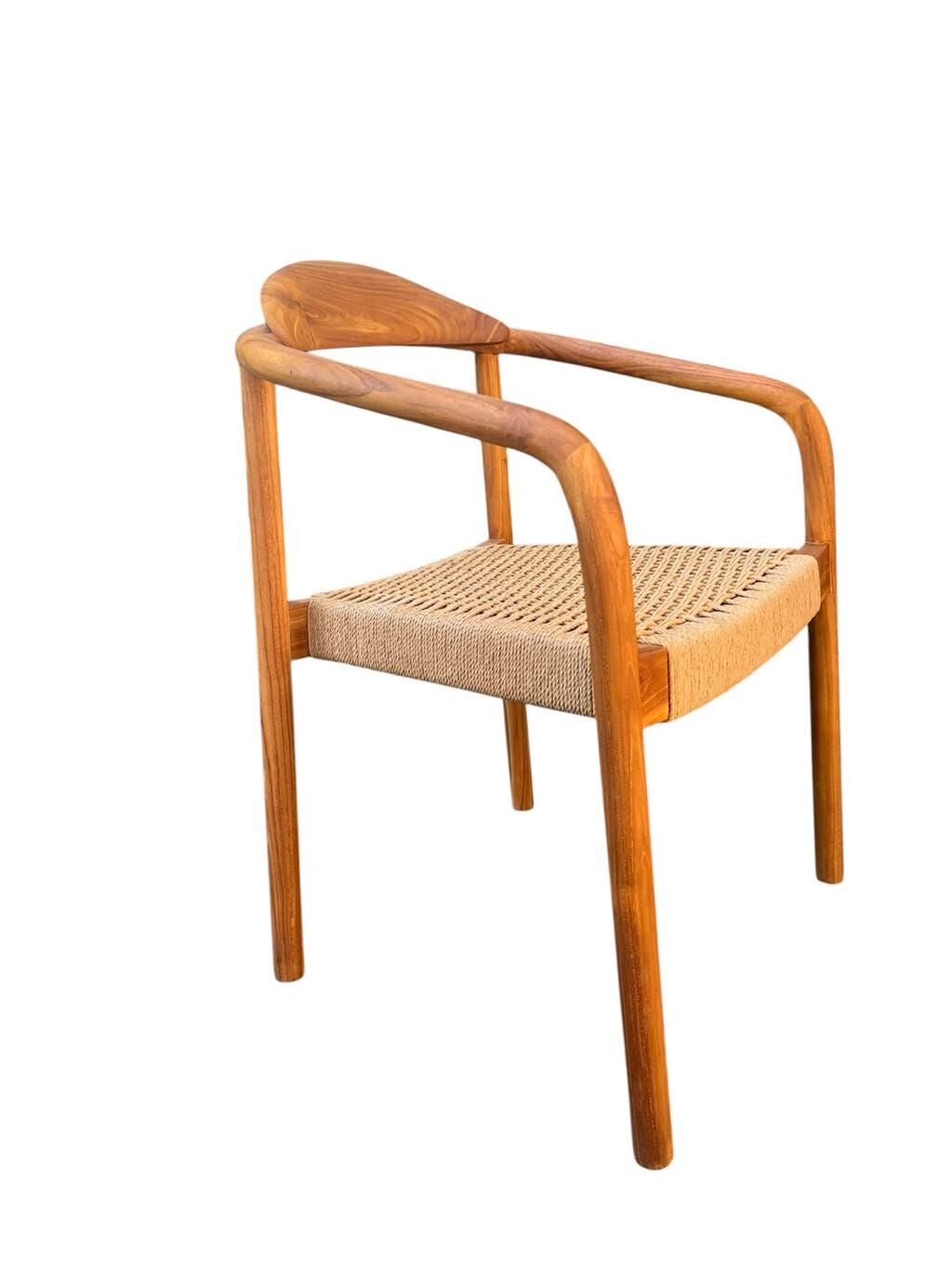 Set of 4 solid wood chairs with cord and armrests.