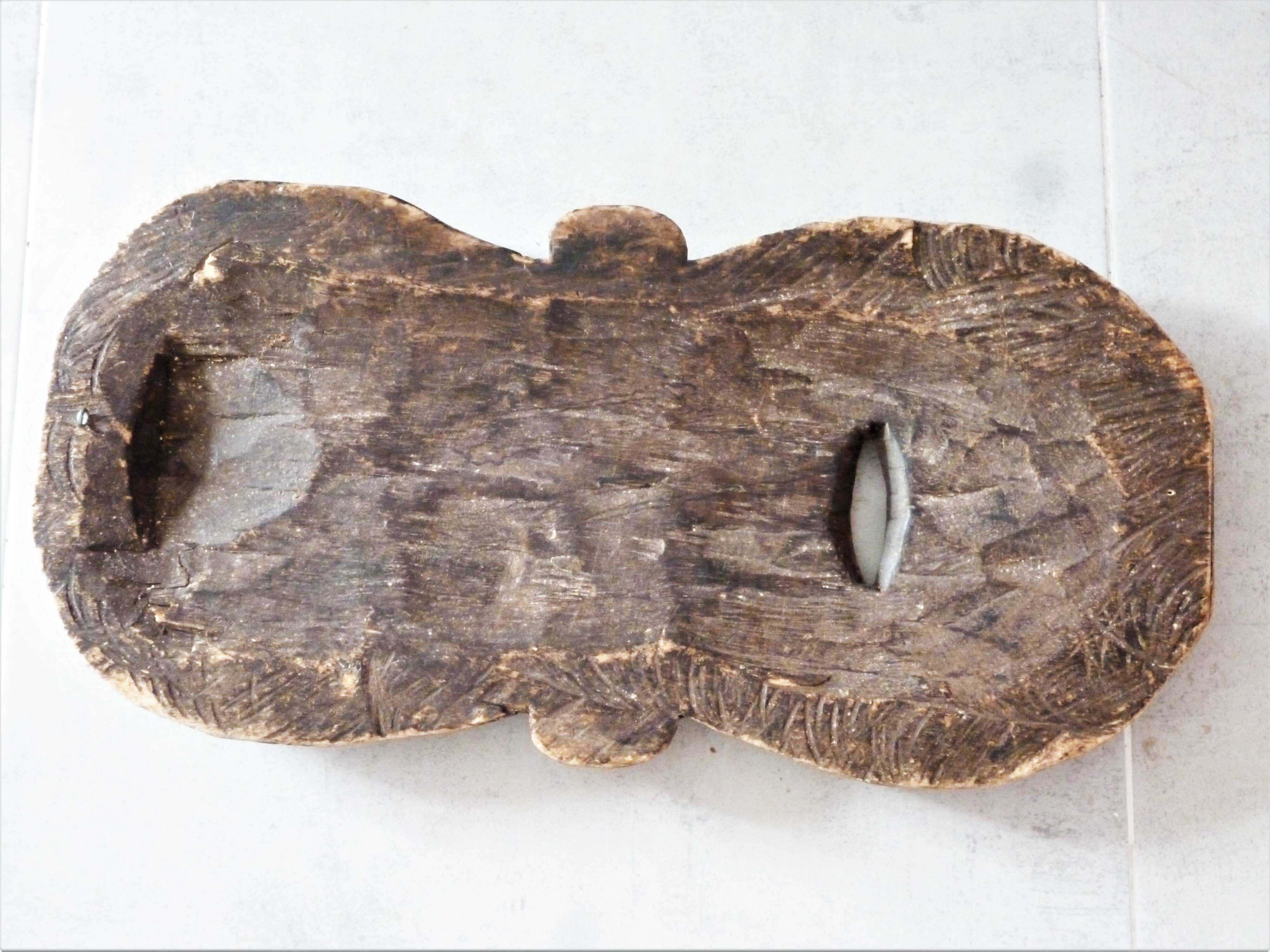 African mask, Hand-carved African wooden mask.