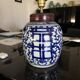 Asian lamp from the early 20th century in blue and white ceramic.