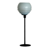 Table lamp with a vintage powder blue globe and a black base