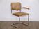 Cesca armchair in wood, metal, and cane from the 1970s.