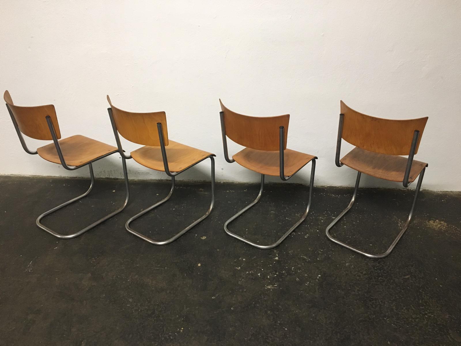 Set of 12 tubular steel chairs Mart Stam