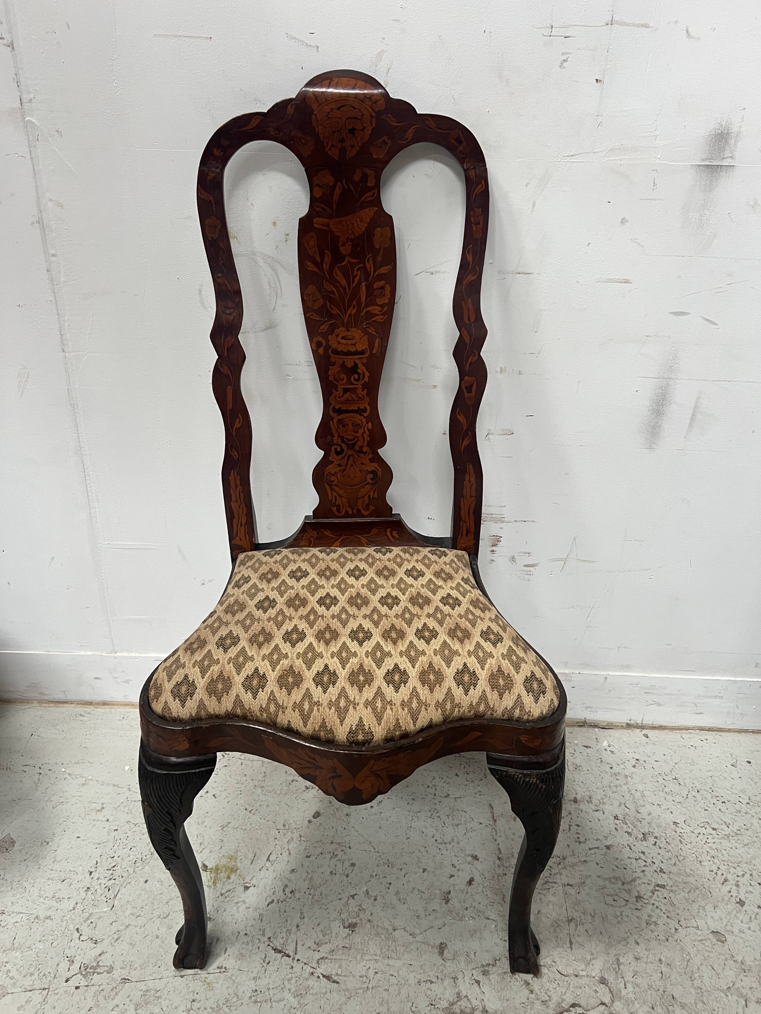 Set of eight Dutch marquetry chairs from the 19th century.