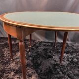 A Louis XVI period mahogany half-moon table forming a console/games table