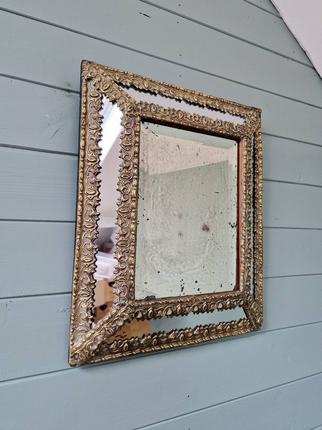 Mirror with embossed brass and mercury glass glazing beads, 19th century