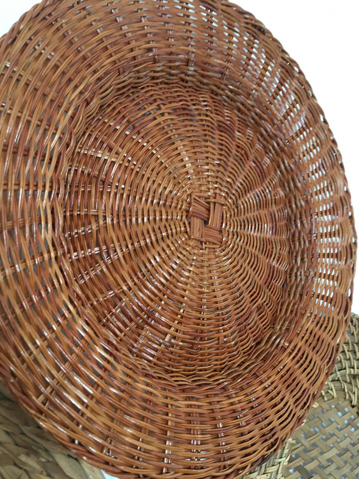 Wall composition of seven baskets and wicker trays