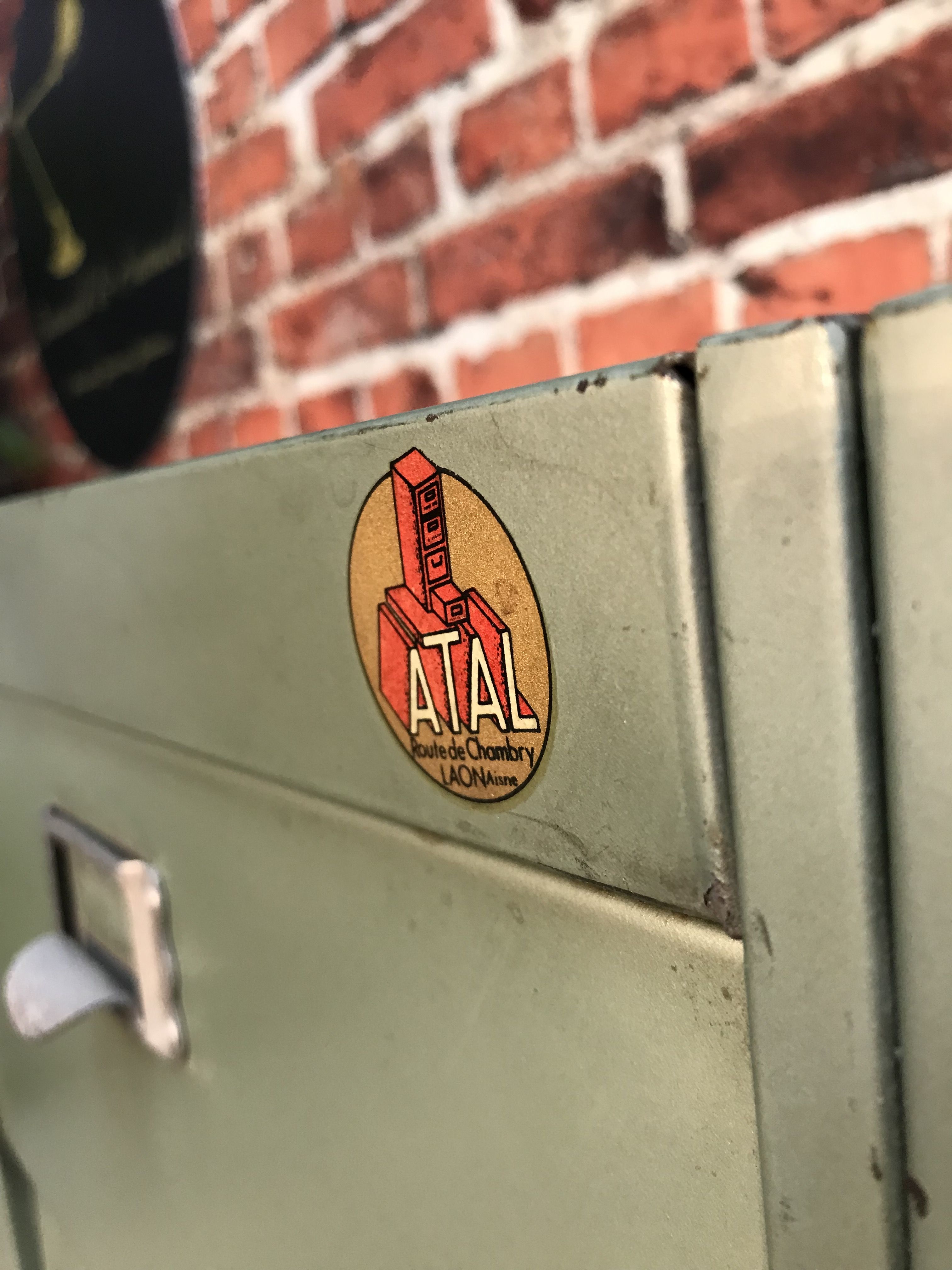 Vintage industrial furniture with metal clamshell atal