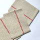 Set of three old tea towels