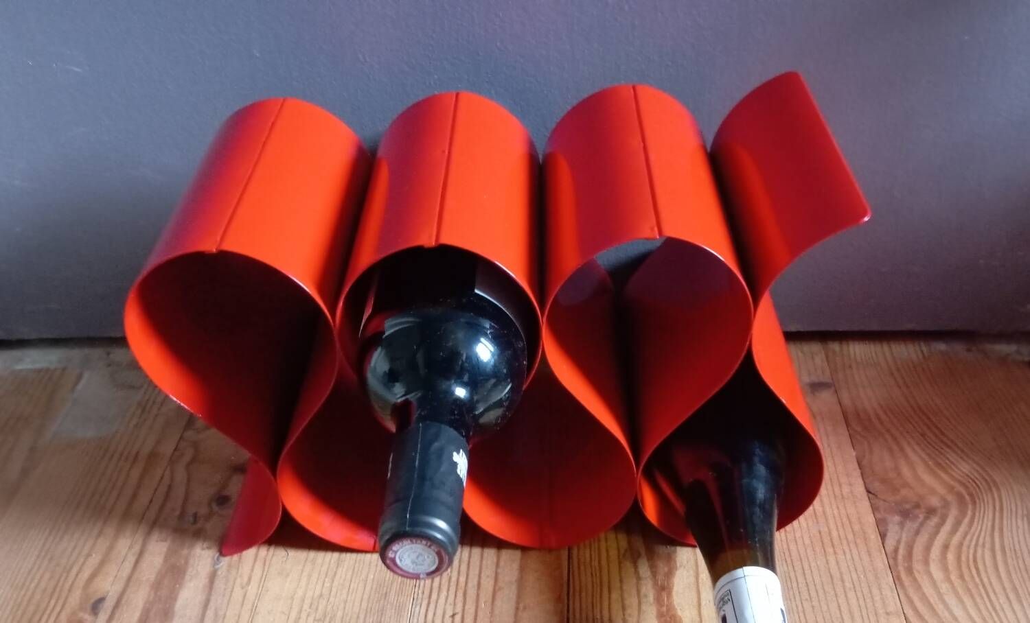 Red painted metal bottle holder, vintage 1980