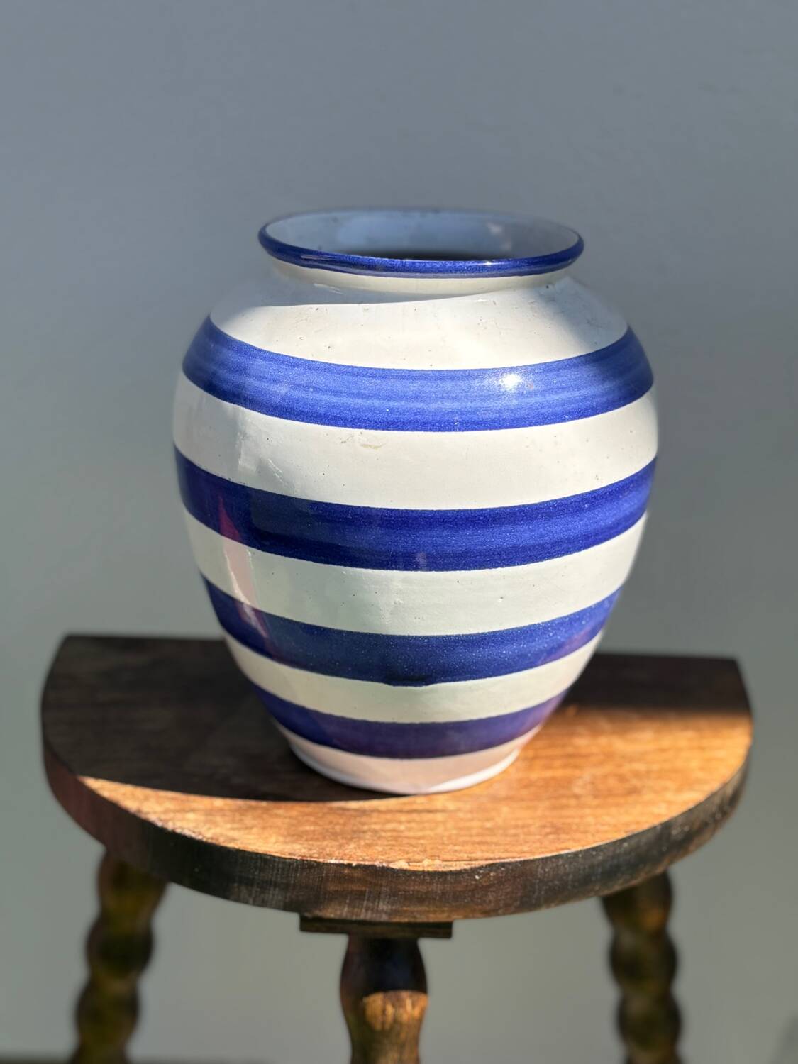 Blue striped ceramic vase