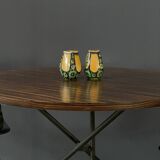 A pair of green and yellow vases