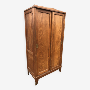 Vintage reconstruction period oak wardrobe with 2 sliding doors.