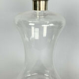 Blown glass carafe with silver frame and cap