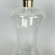 Blown glass carafe with silver frame and cap
