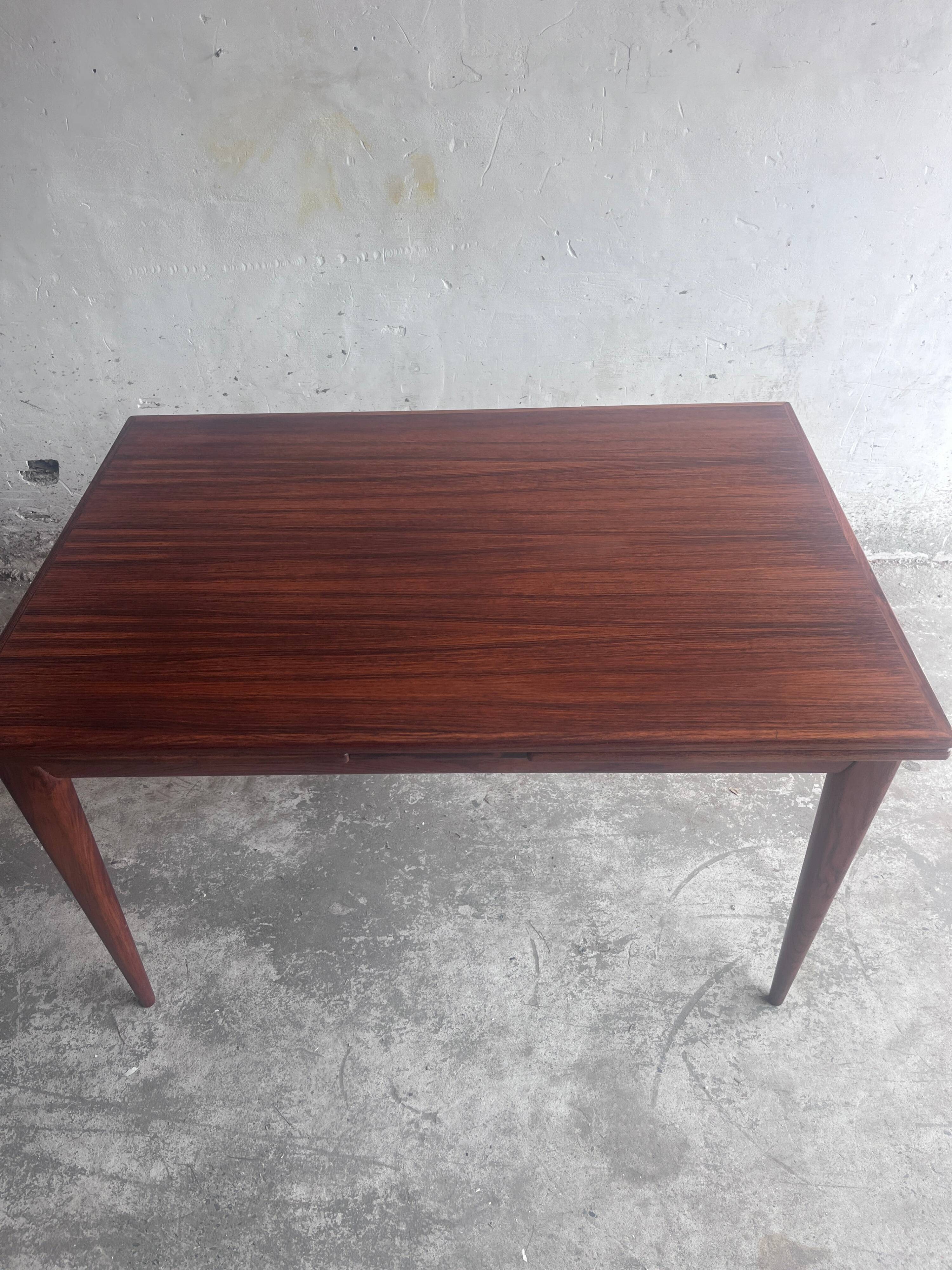 Danish extendable dining table in rosewood by Niels O. Møller, model 254, Denmark, 1960s.