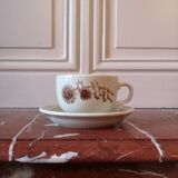 Four large cups and their tea service cups