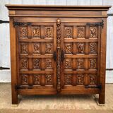 Spanish furniture with carved wood profiles and coats of arms from the 1950s.