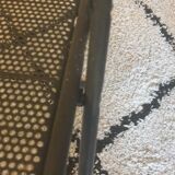 Pair of folding chairs in perforated metal