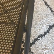Pair of folding chairs in perforated metal