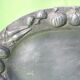 Service tray made of cast aluminium with vegetable decoration