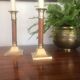 Pair of wood and brass candle holders