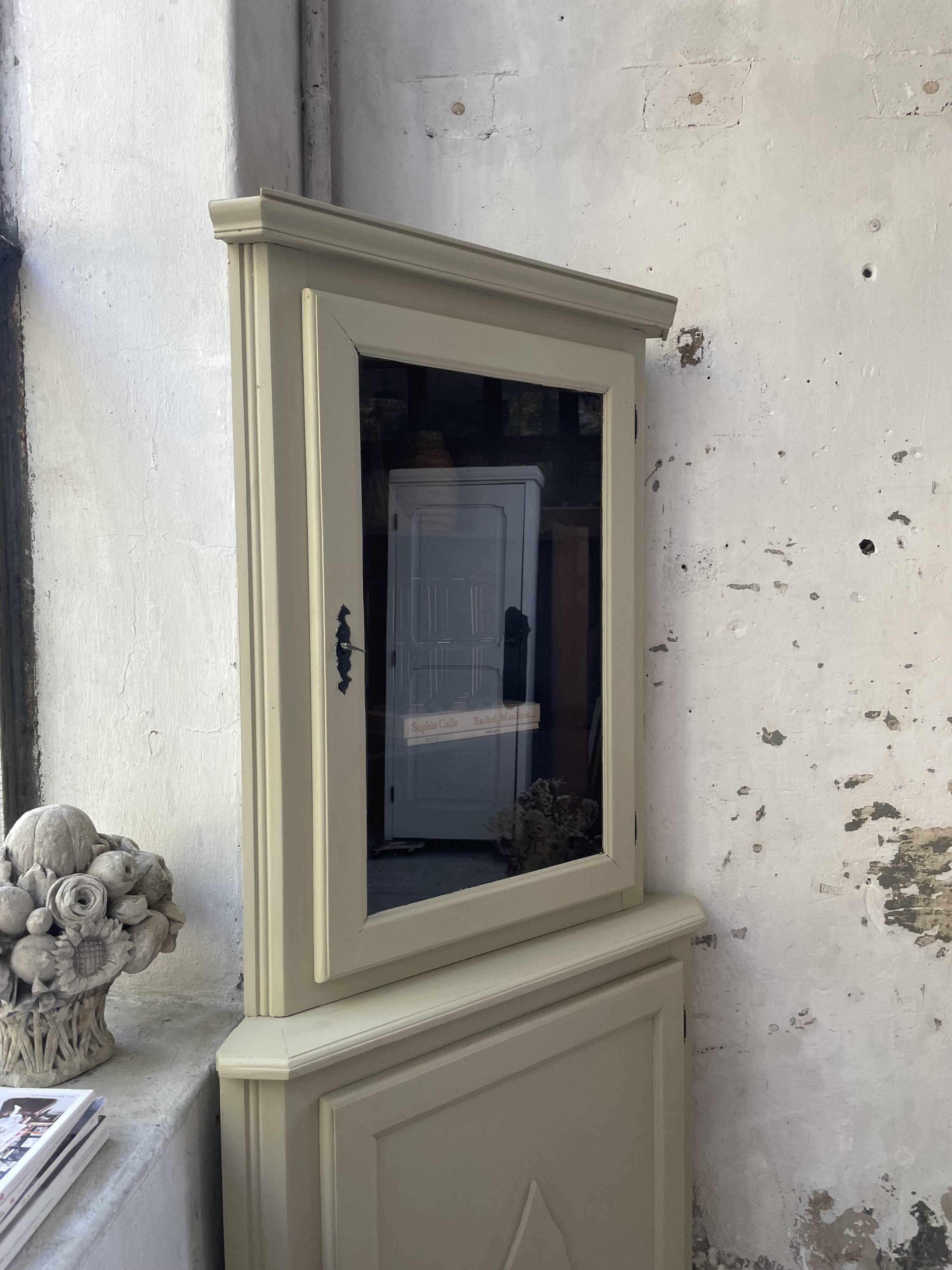 Corner display cabinet from the 1950s