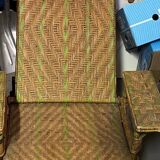 Old long chair rattan wicker garden armchair