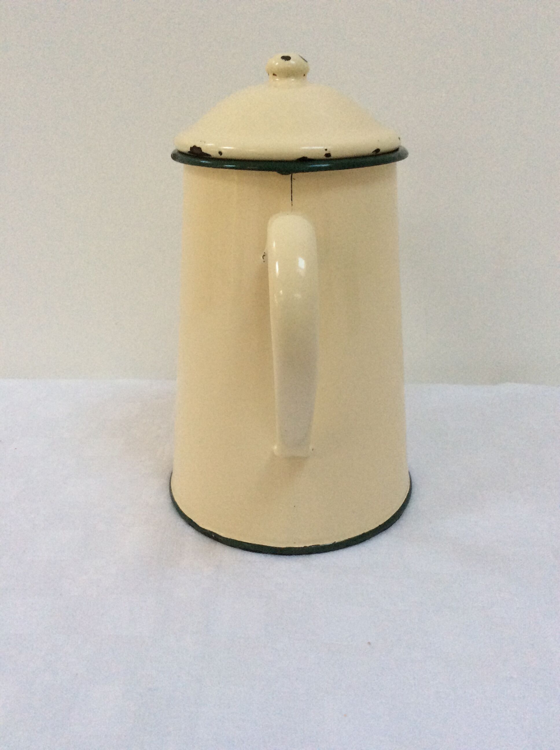 Old pale yellow enamel coffee pot