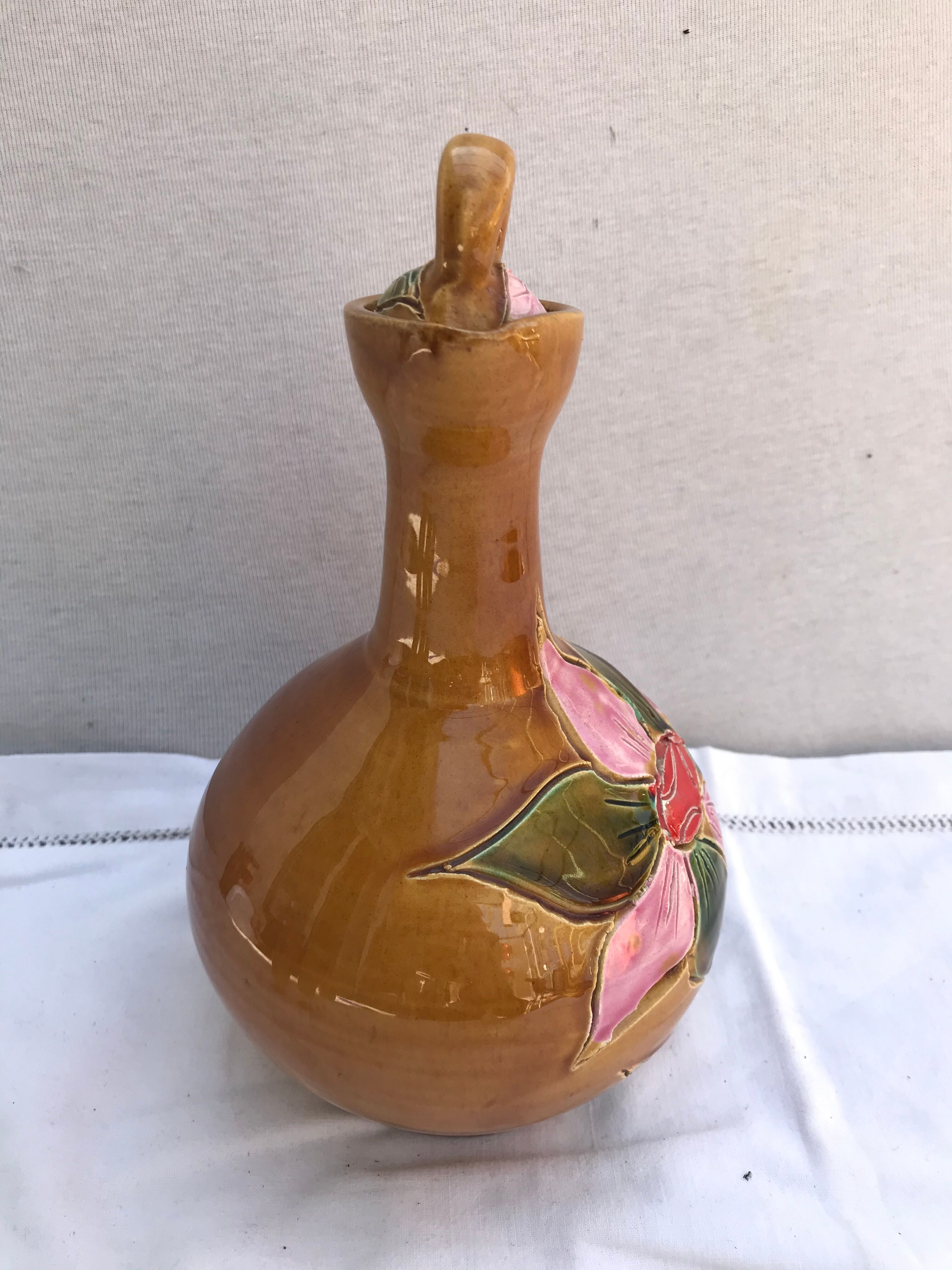 Old carafe with 8 ceramic glasses