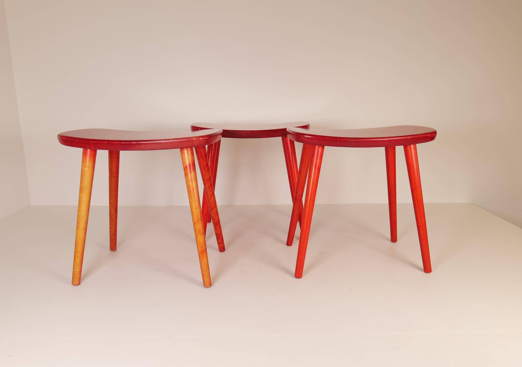 Swedish stools in red lacquered birch, Yngve Ekström "Palle", 1970s