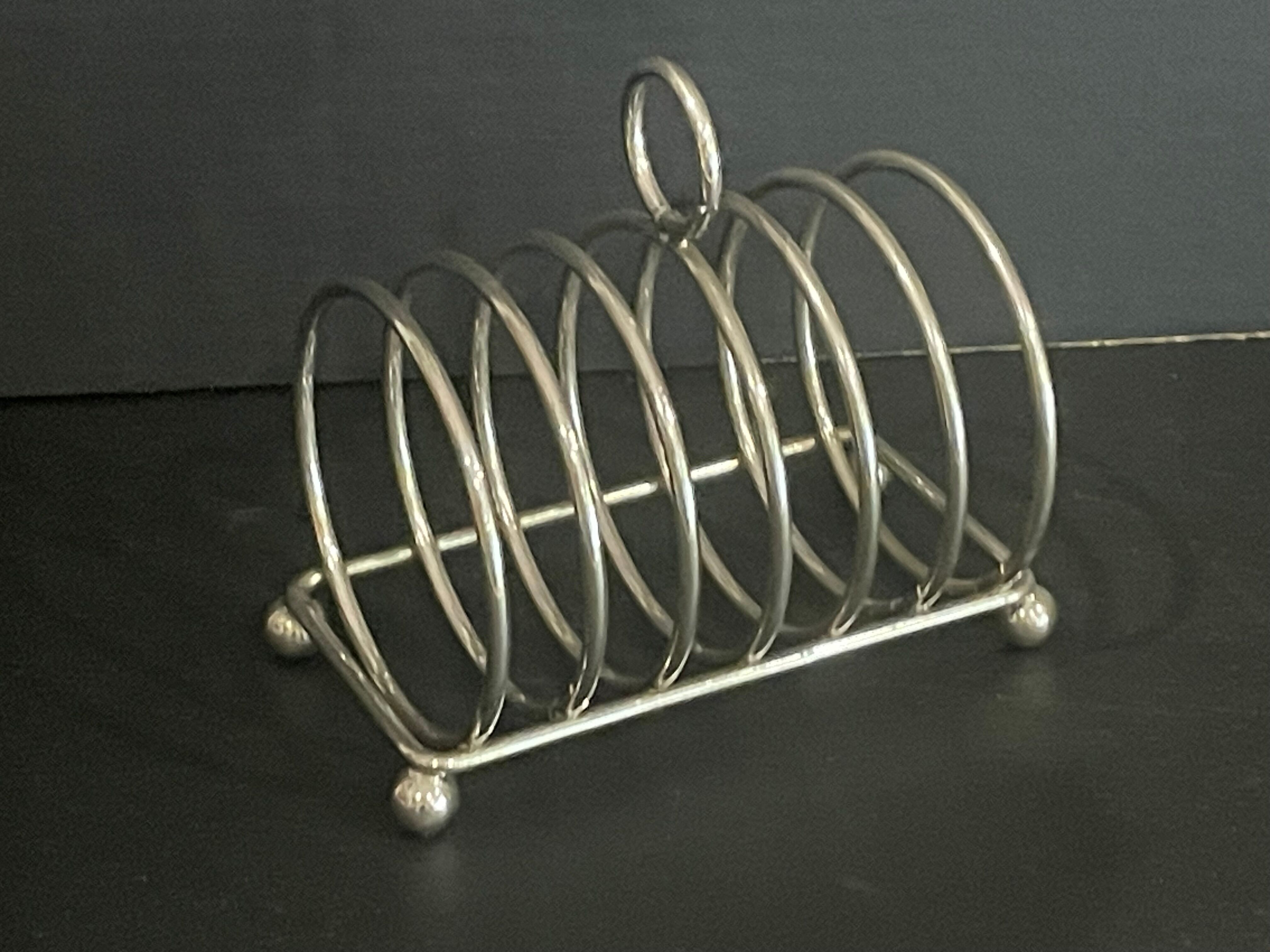 Toast holder in silver metal