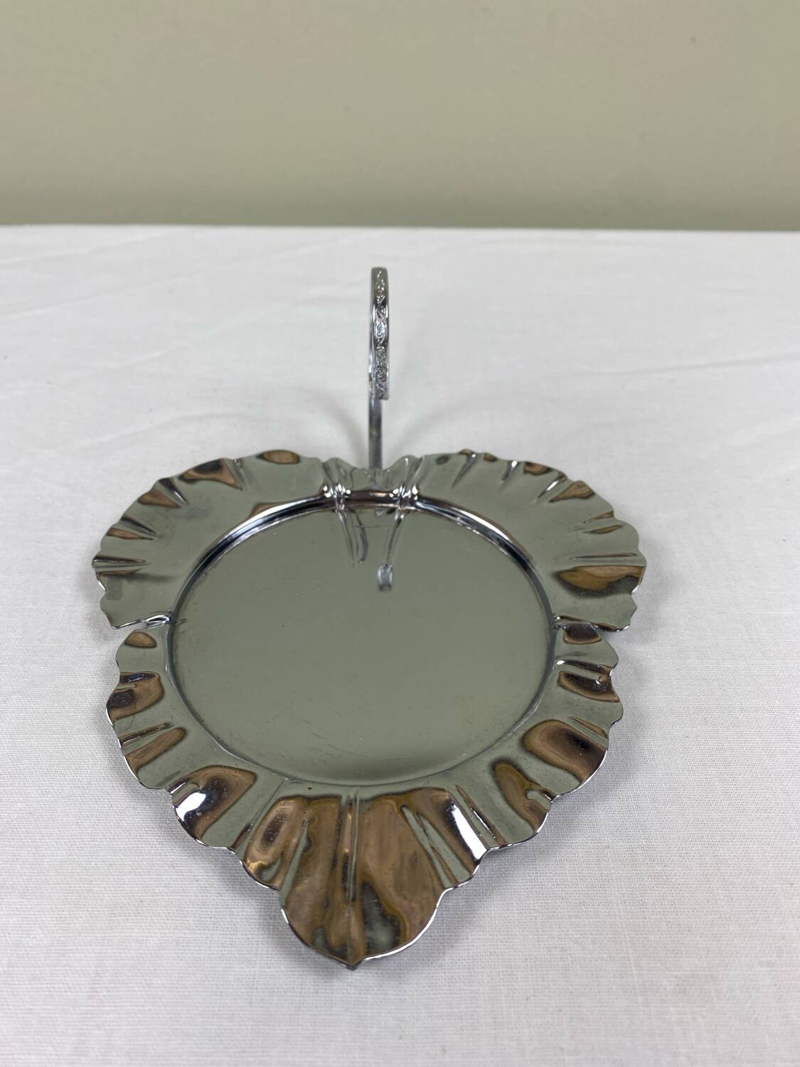 Metal and glass bowl