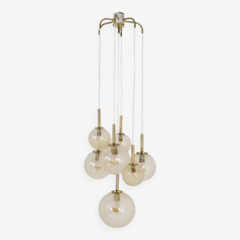 “Cascade” brass chandelier with amber globes