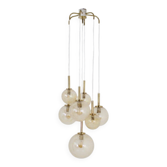 “Cascade” brass chandelier with amber globes