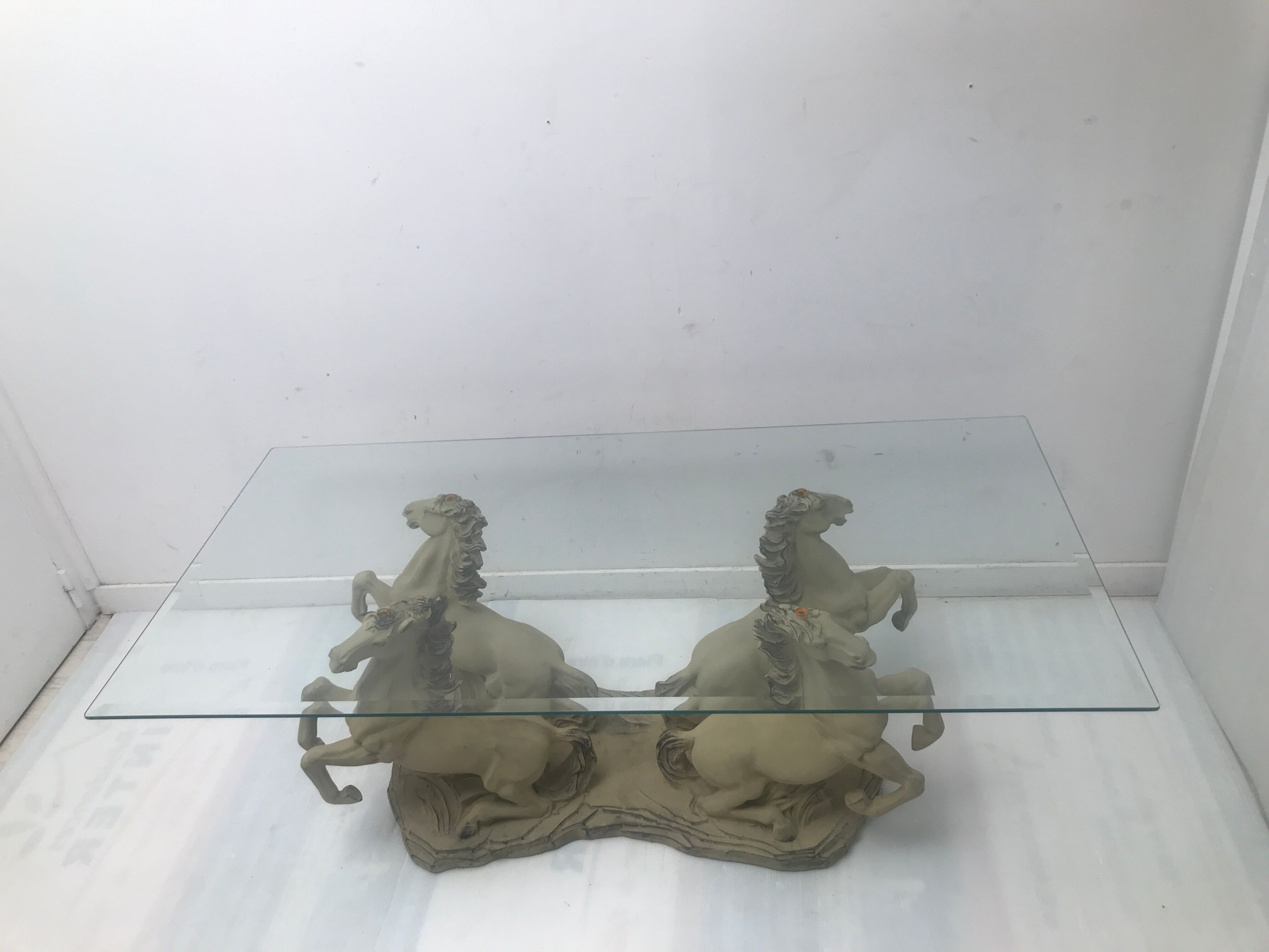 Coffee table glass top on 4 vintage horses