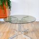 Round coffee table in smoked glass and chrome, star base, design, 1970.