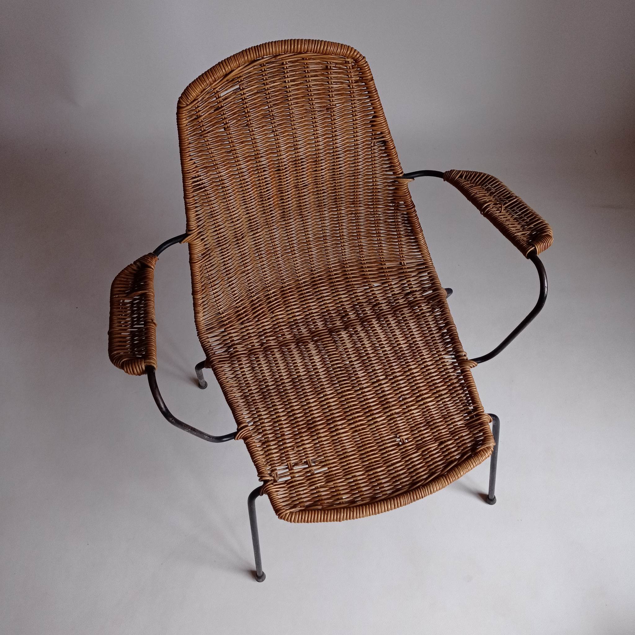 Wicker chair with Campo and Graffi armrests from the 60s.