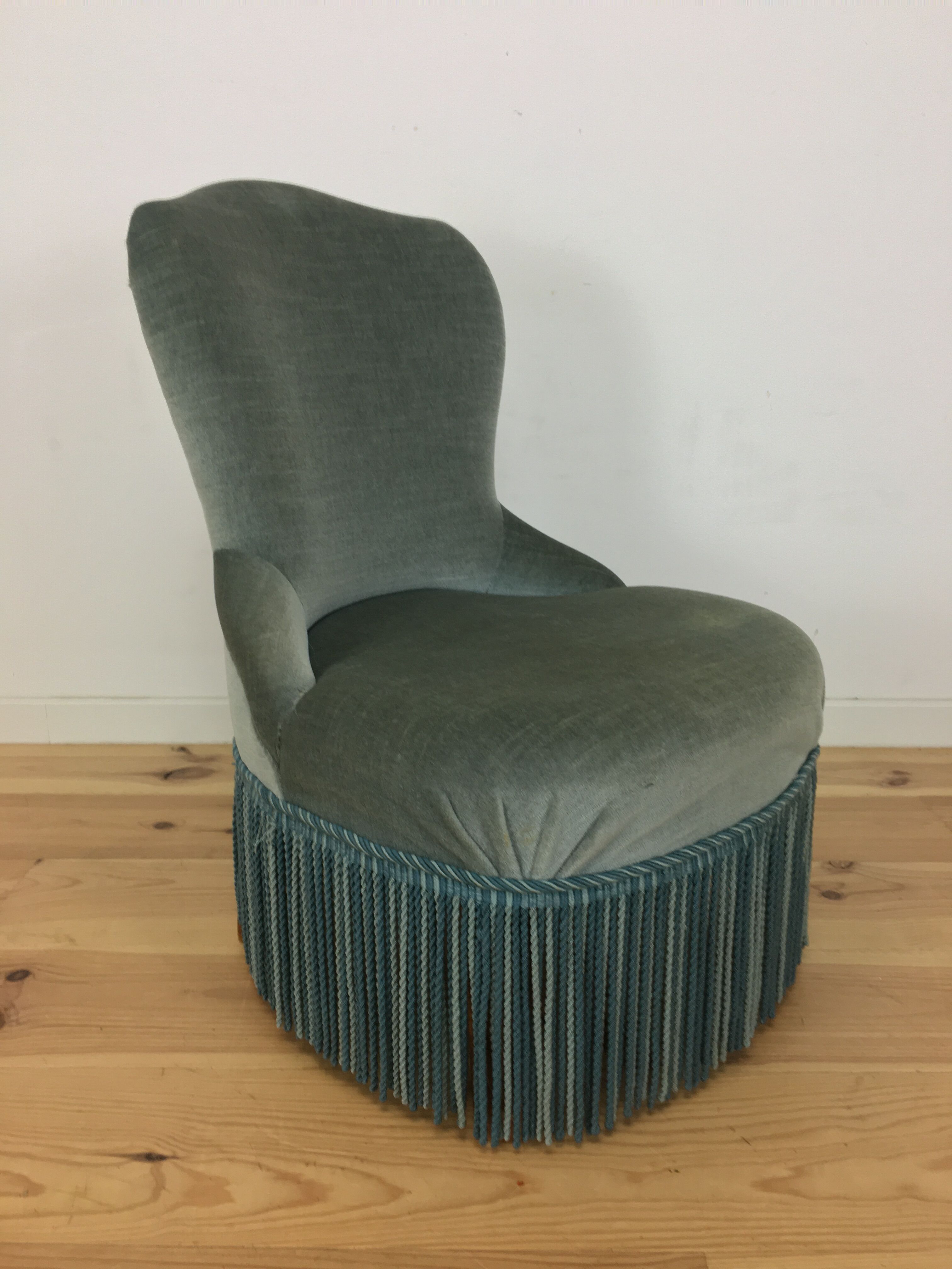 Fauteuil crapaud velours vert à franges