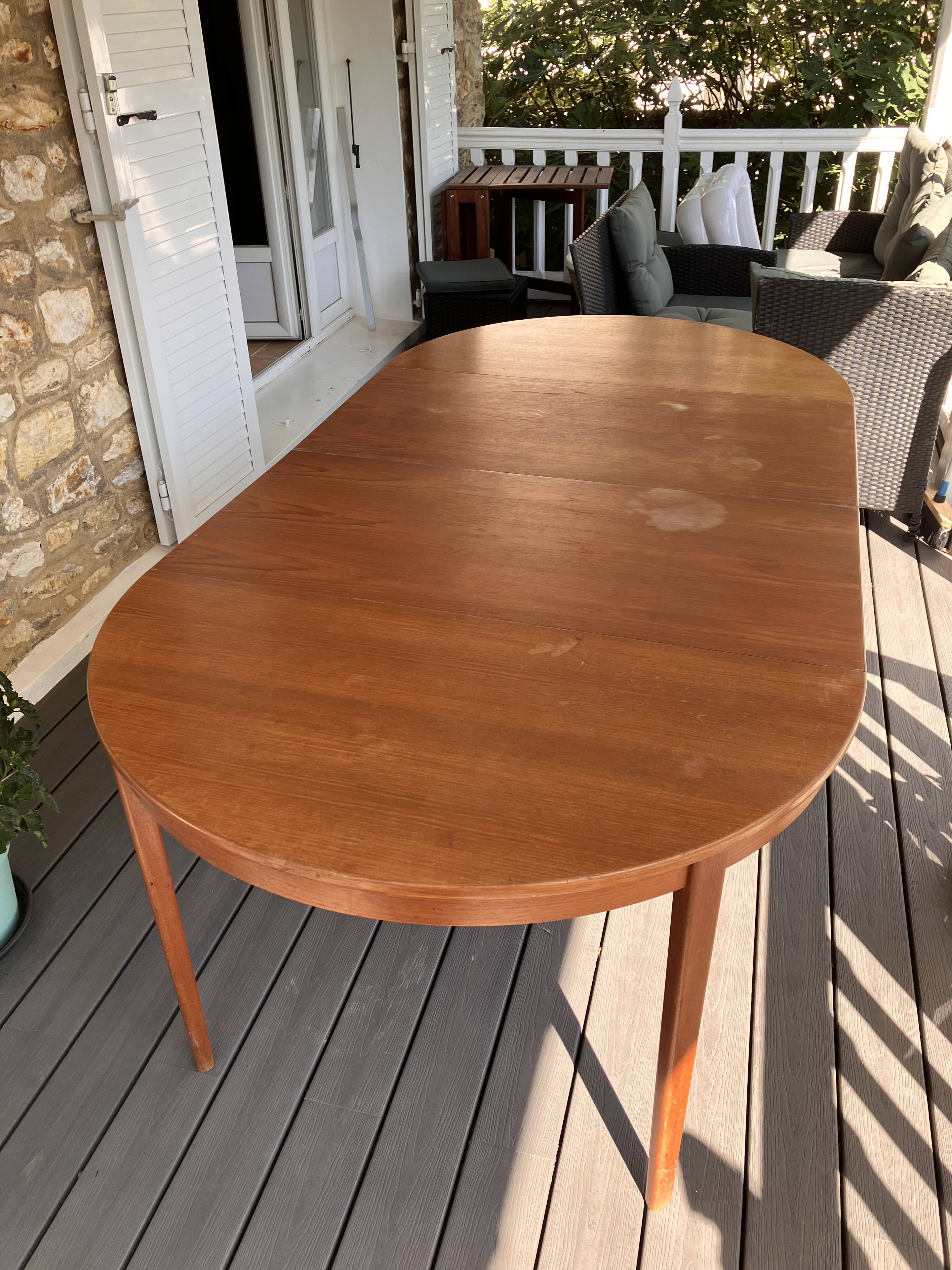 Extendable round teak table by Bertil Fridhagen for Bodafors