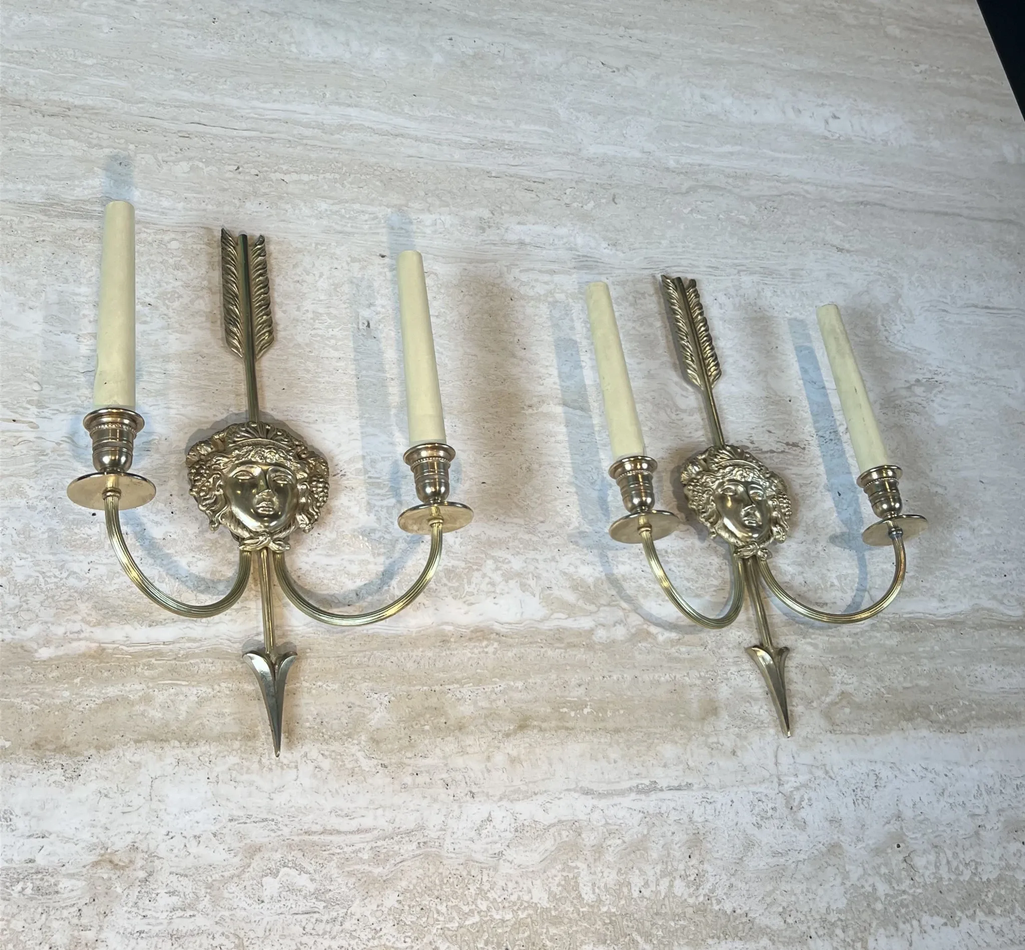 Pair of Two-Arm Bronze Wall Lights with Arrow and Mask Decoration