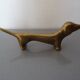 Series of 6 vintage gilded brass dachshund knife holders