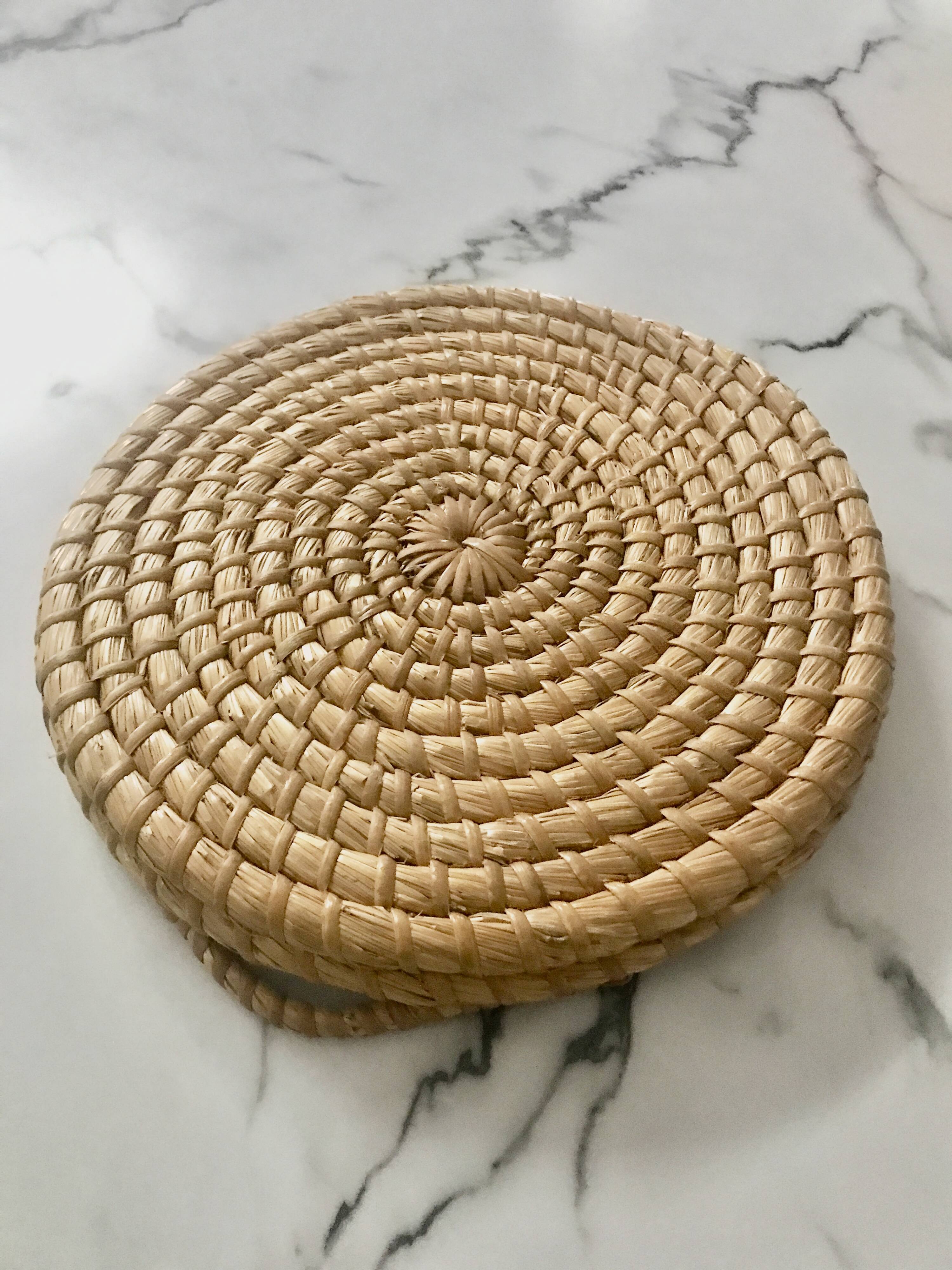 Turned wicker tray and vintage glass