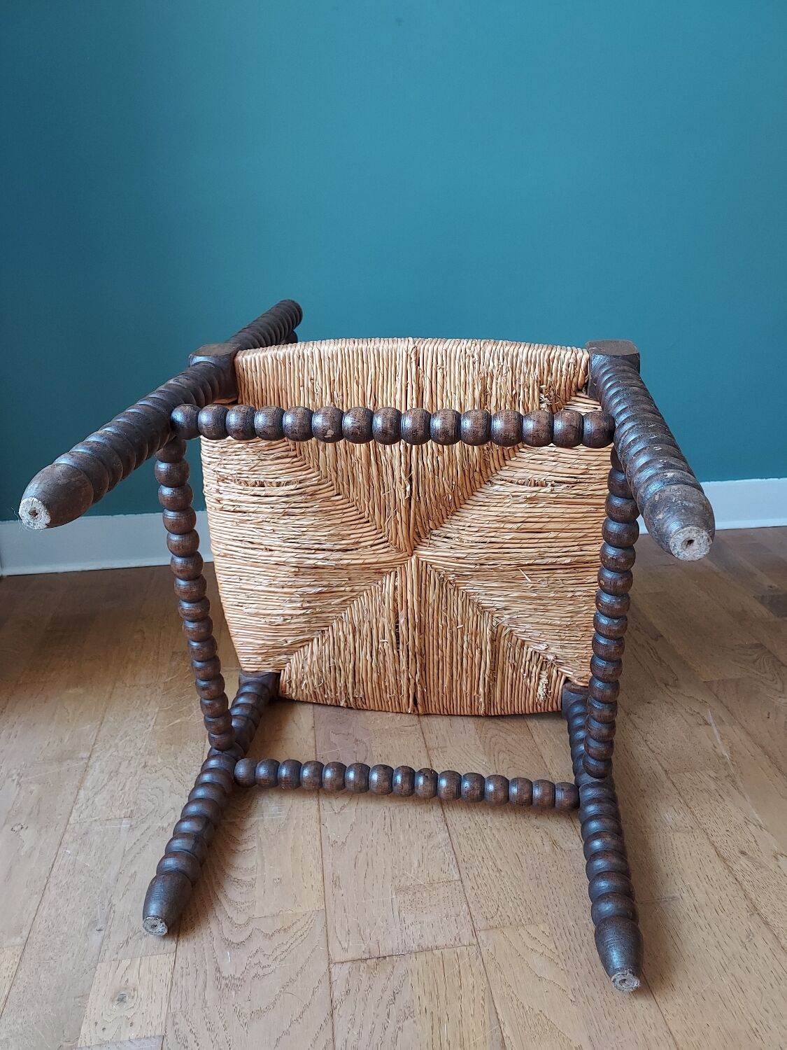 Corner armchair in turned wood