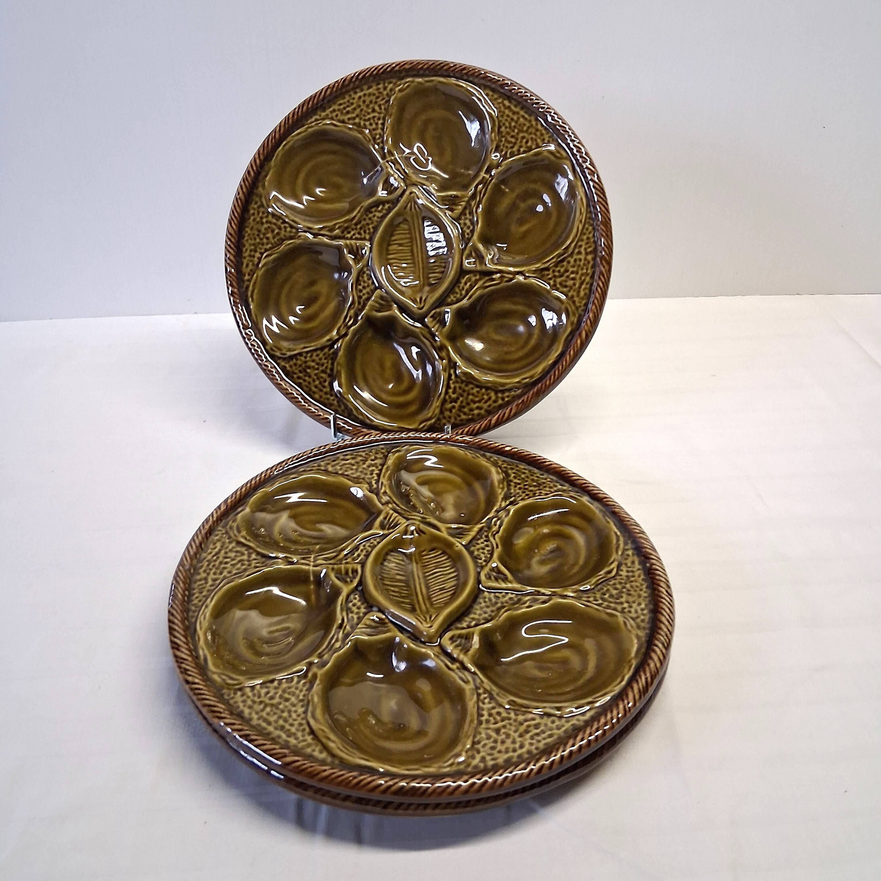 3 green majolica oyster plates from St Clément in good condition.