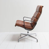 Eames lounge chair model EA 216 softpad in cognac