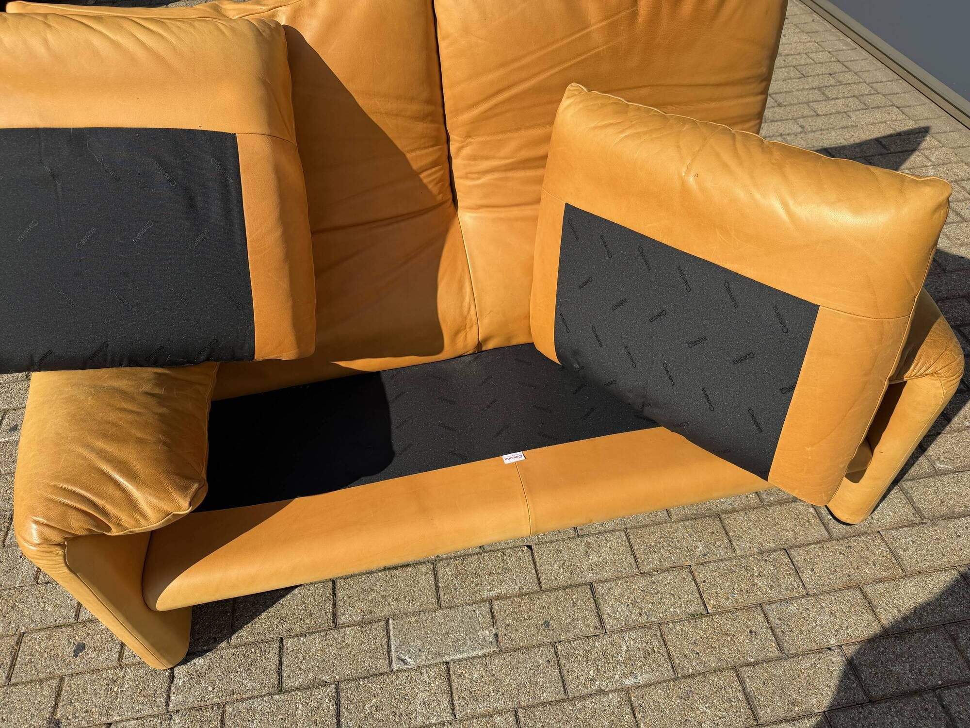 Beautiful Cassina Maralunga 2-seater in camel light patinated natural leather.